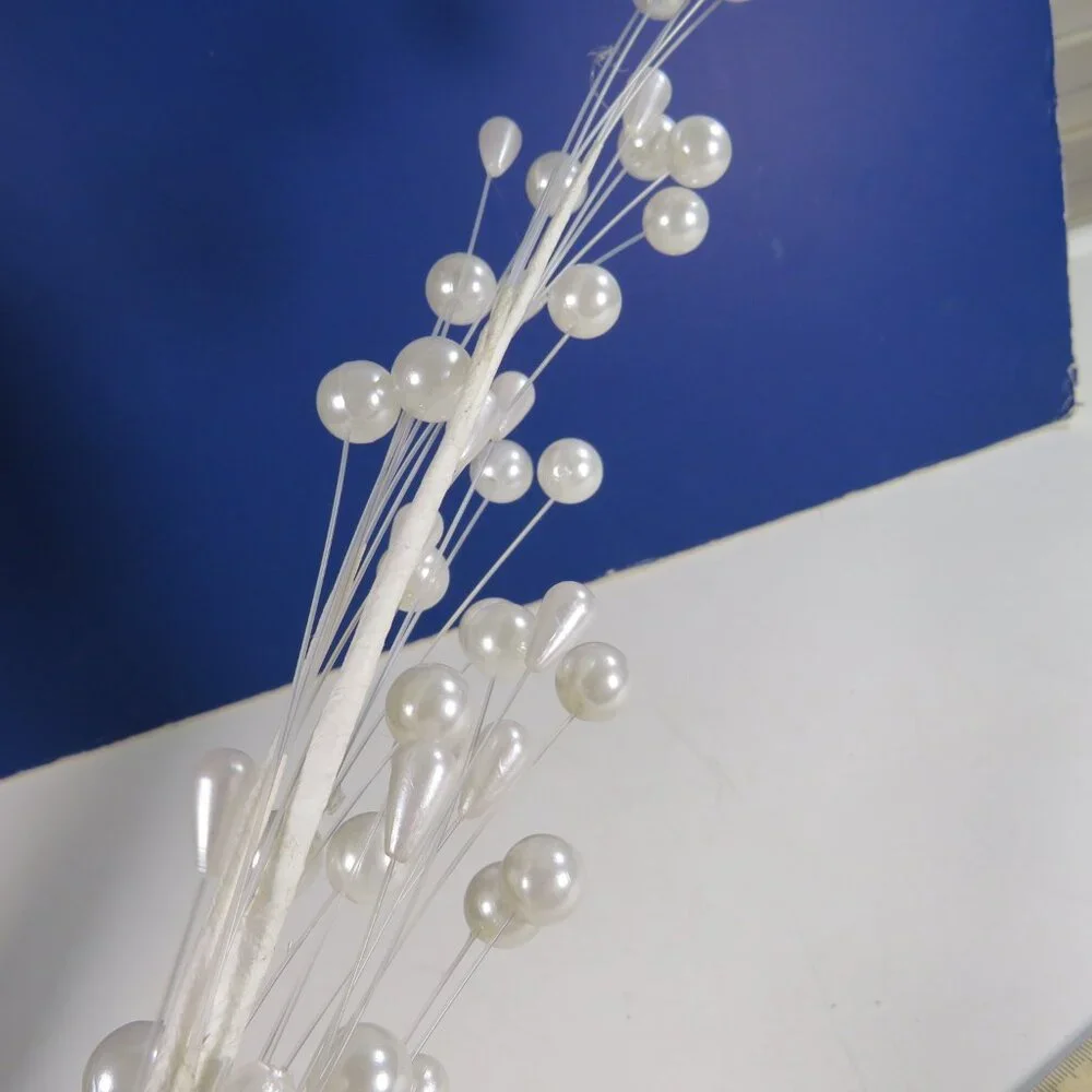 Pearl Cascading Floral Pick (has some wire but mostly clear filament) vintage